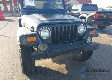 2003 Jeep Wrangler Sahara z USA, uszkodzony, nr VIN 1J4FA59S33P327992